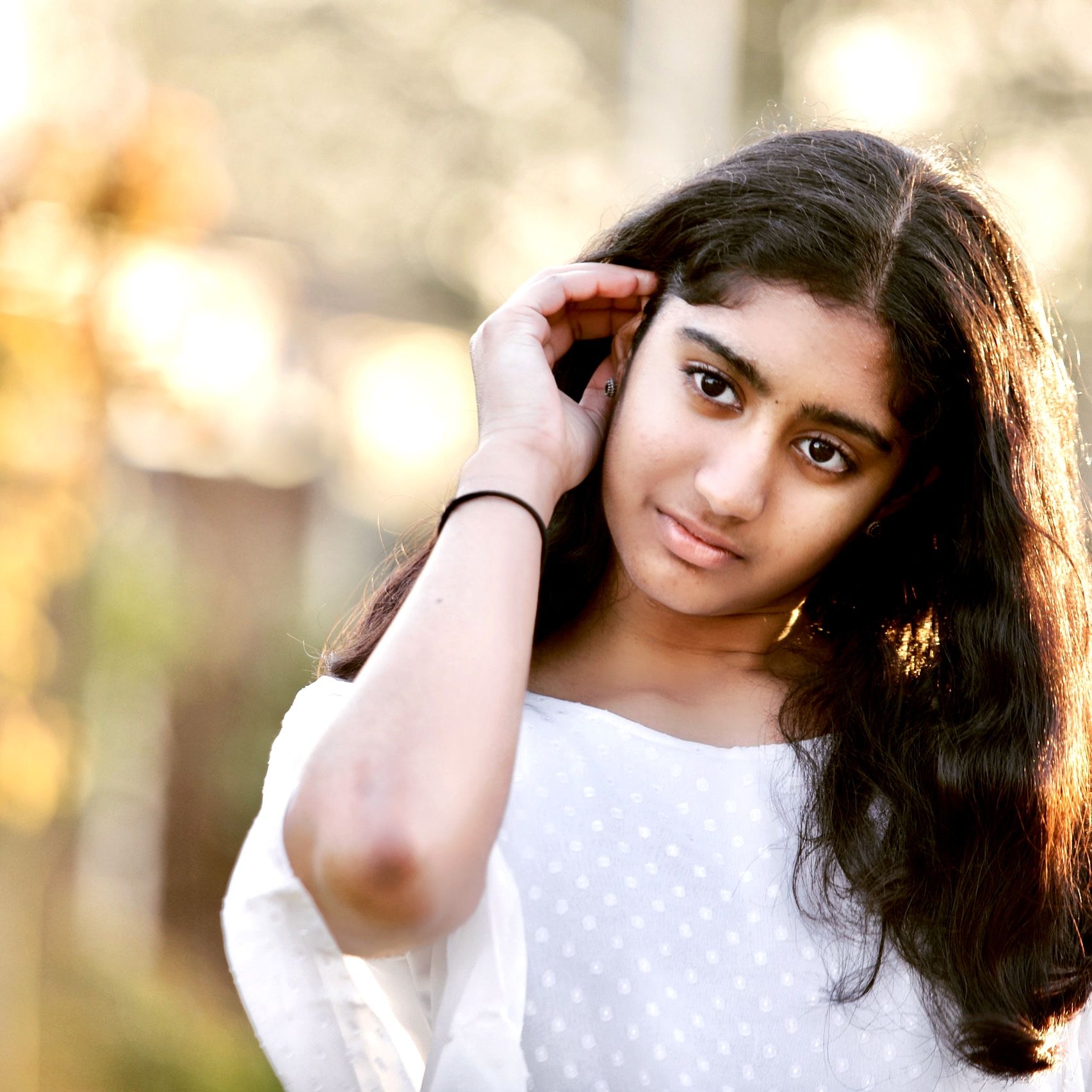 Teenage girl portrait in warm golden light